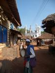 Muslim collecting money. Along the coast most are muslim except for Goa due to the christian Portugese